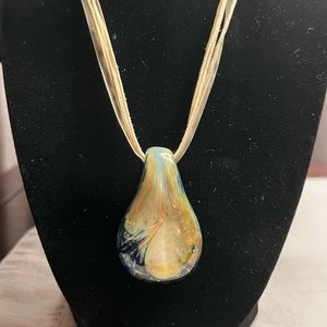 Glass pendant on ribbon necklace